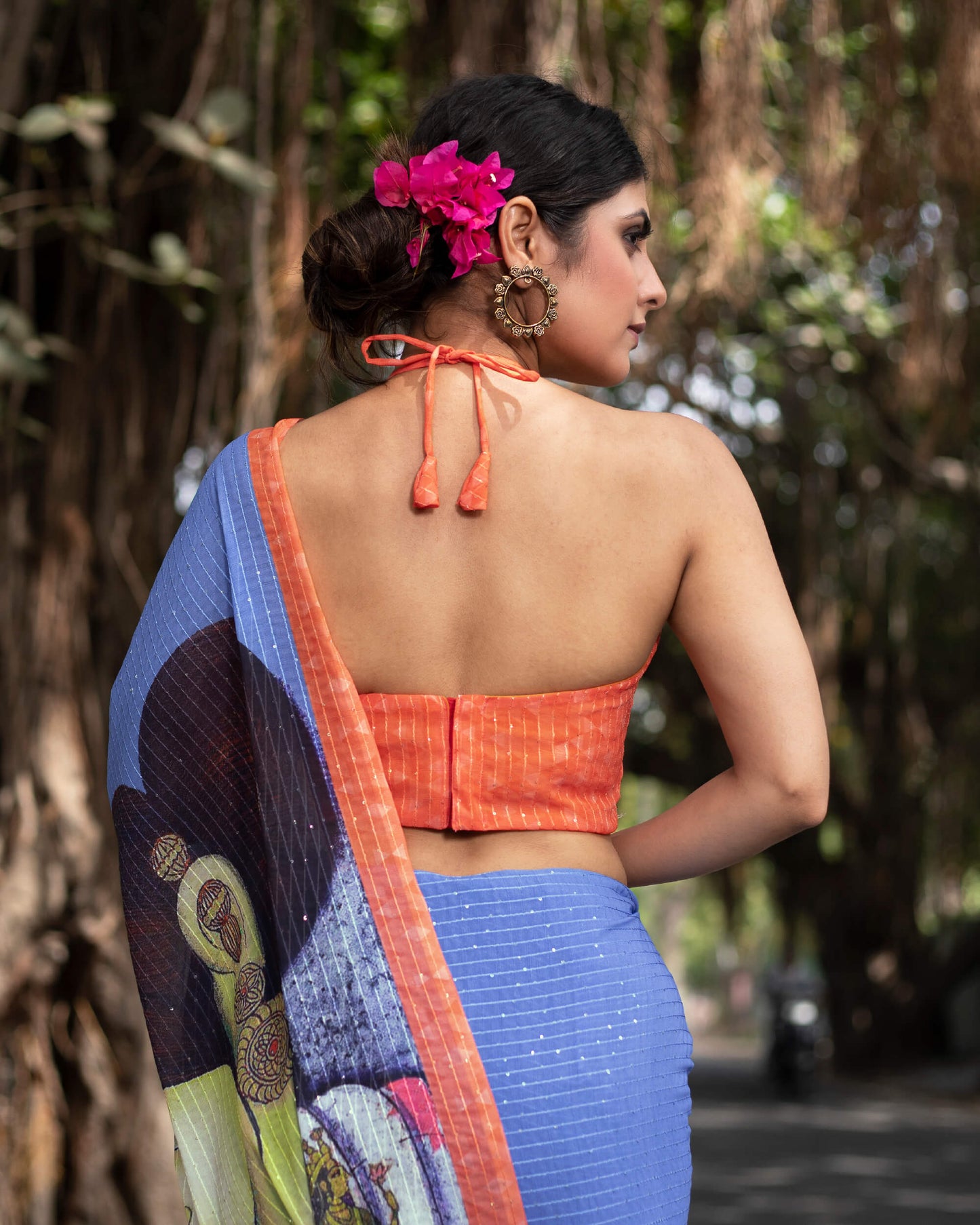 Cornflower Blue and Salmon Orange Quirky Pattern Premium Sequins Georgette Saree With Tassels