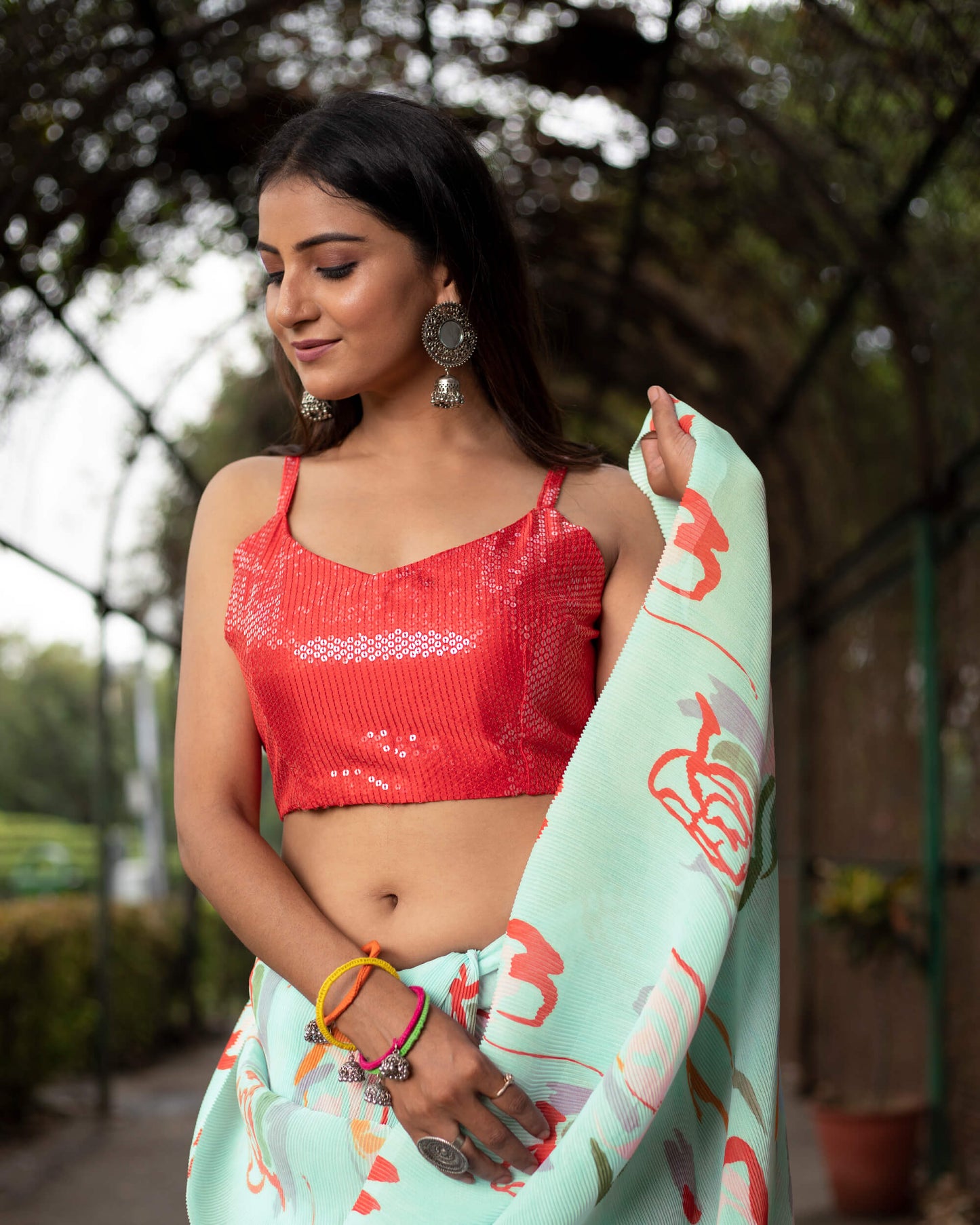 Baby Blue And Vermilion Red Quirky Pattern Digital Print Georgette Pleated Saree
