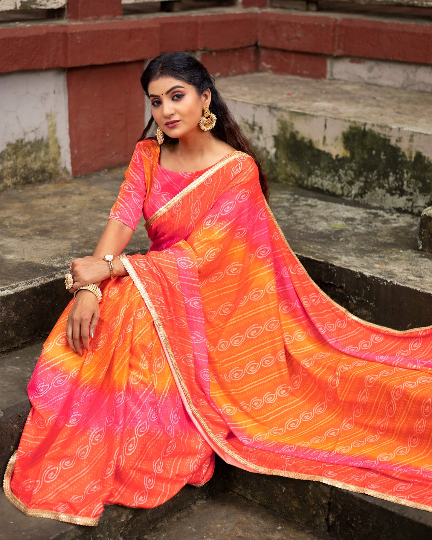 Candy Red And Carrot Orange Bandhanii Pattern Digital Print Crepe Silk Saree With Sequins Lace