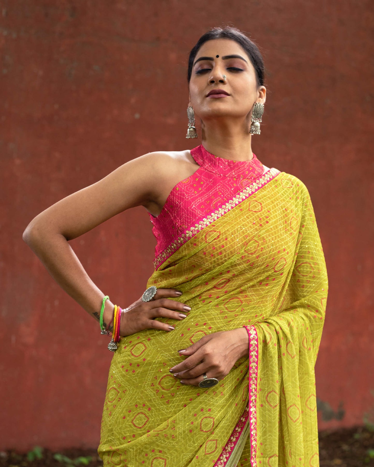 Olive Green And Pink Bandhanii Pattern Sequins Georgette Saree With Lace Border