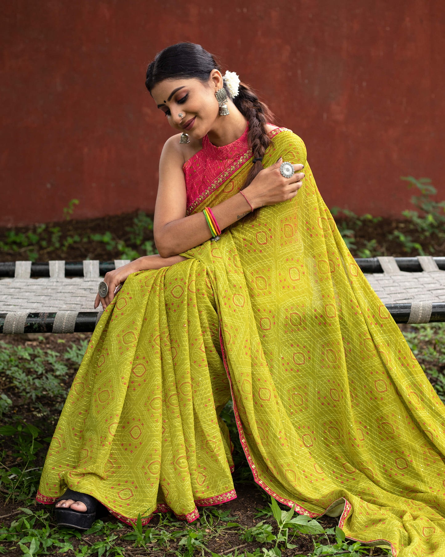 Olive Green And Pink Bandhanii Pattern Sequins Georgette Saree With Lace Border