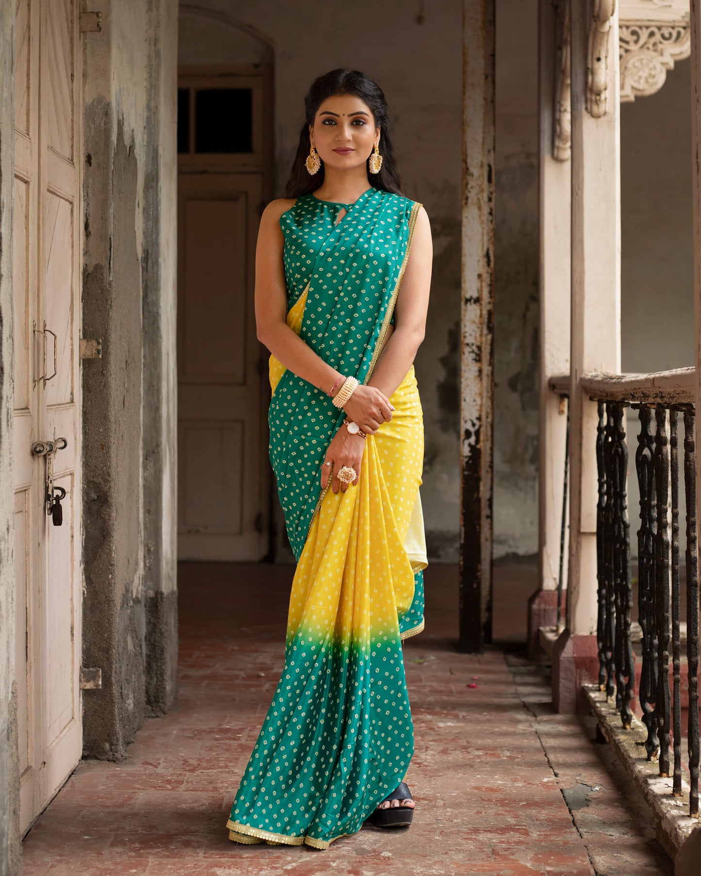 Yellow And Prussian Green Bandhanii Pattern Digital Print Crepe Silk Saree With Lace Border
