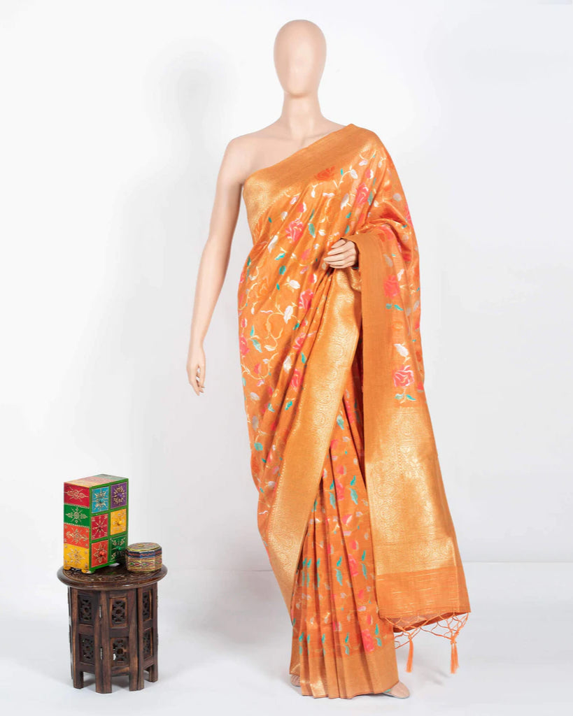 Orange And Fuchsia Floral Pattern Zari Jacquard Borderd Art Tussar Silk Premium Saree With Tassels