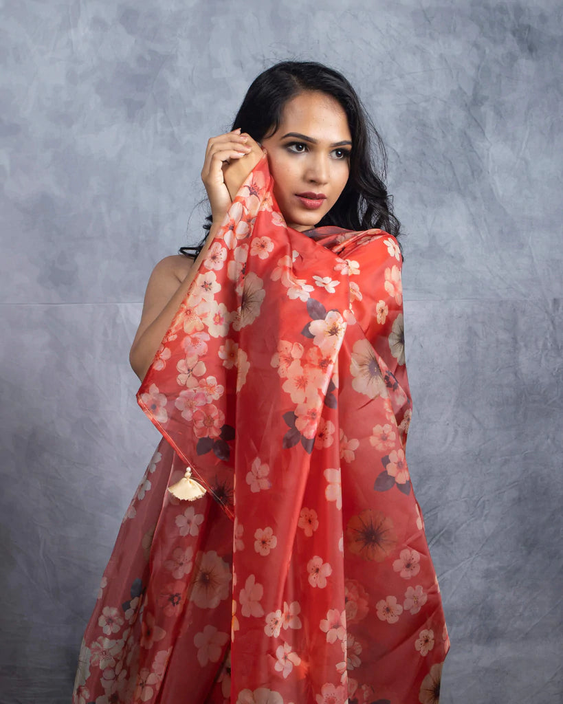 Wine Red And Beige Floral Pattern Liquid Organza Saree With Tassels