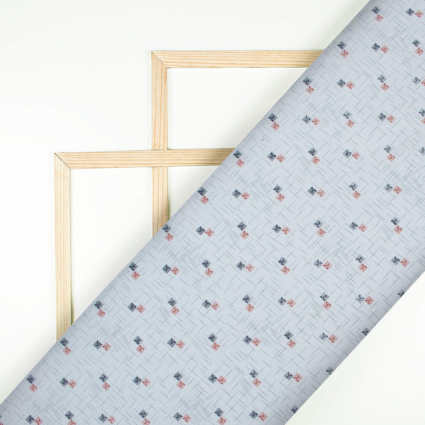Powder Blue And Red Geometric Pattern Printed Poly Spun Exclusive Fabric (Width 36 Inches)