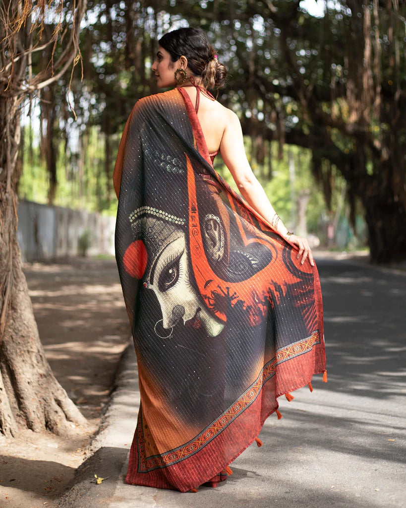 Cidar Orange And Black Quirky Pattern Premium Sequins Georgette Saree With Tassels