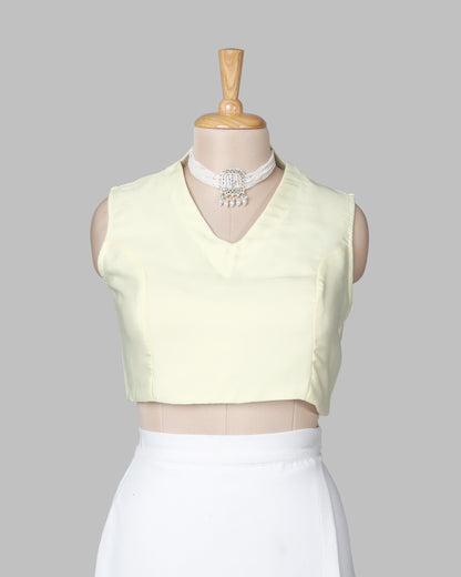 Off White Plain Sleeveless V-Neck Blouse