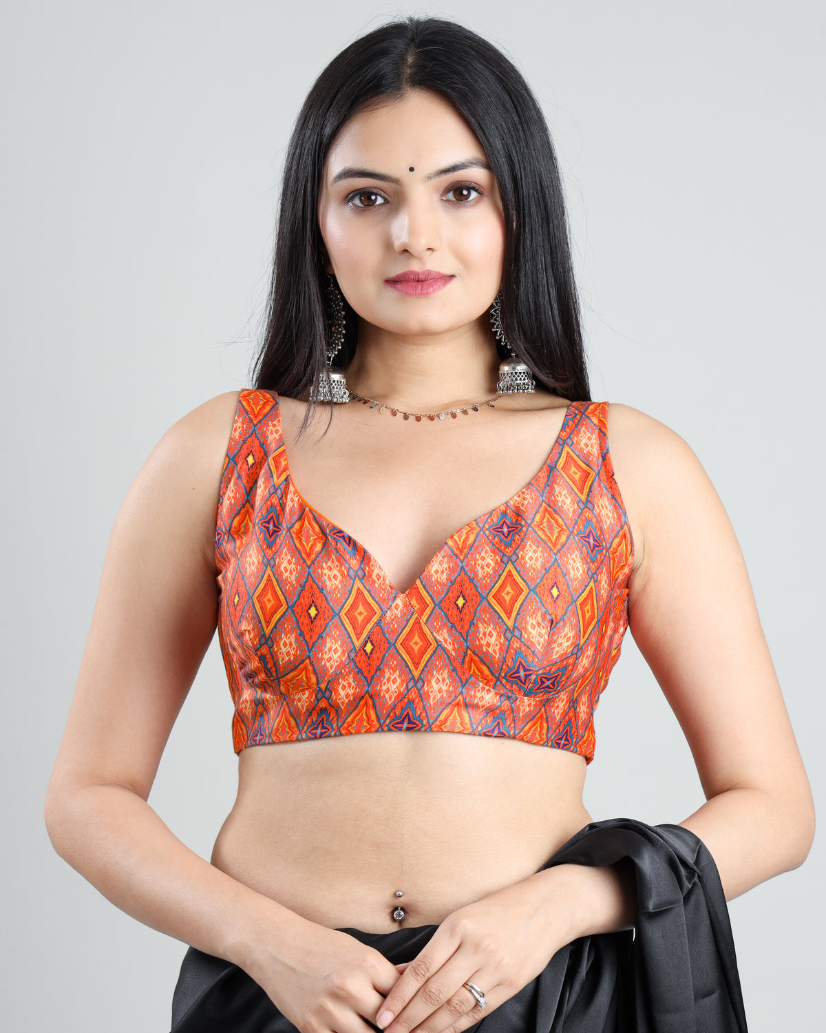 Cool And Chic Sleeveless Ikkat Print Blouse