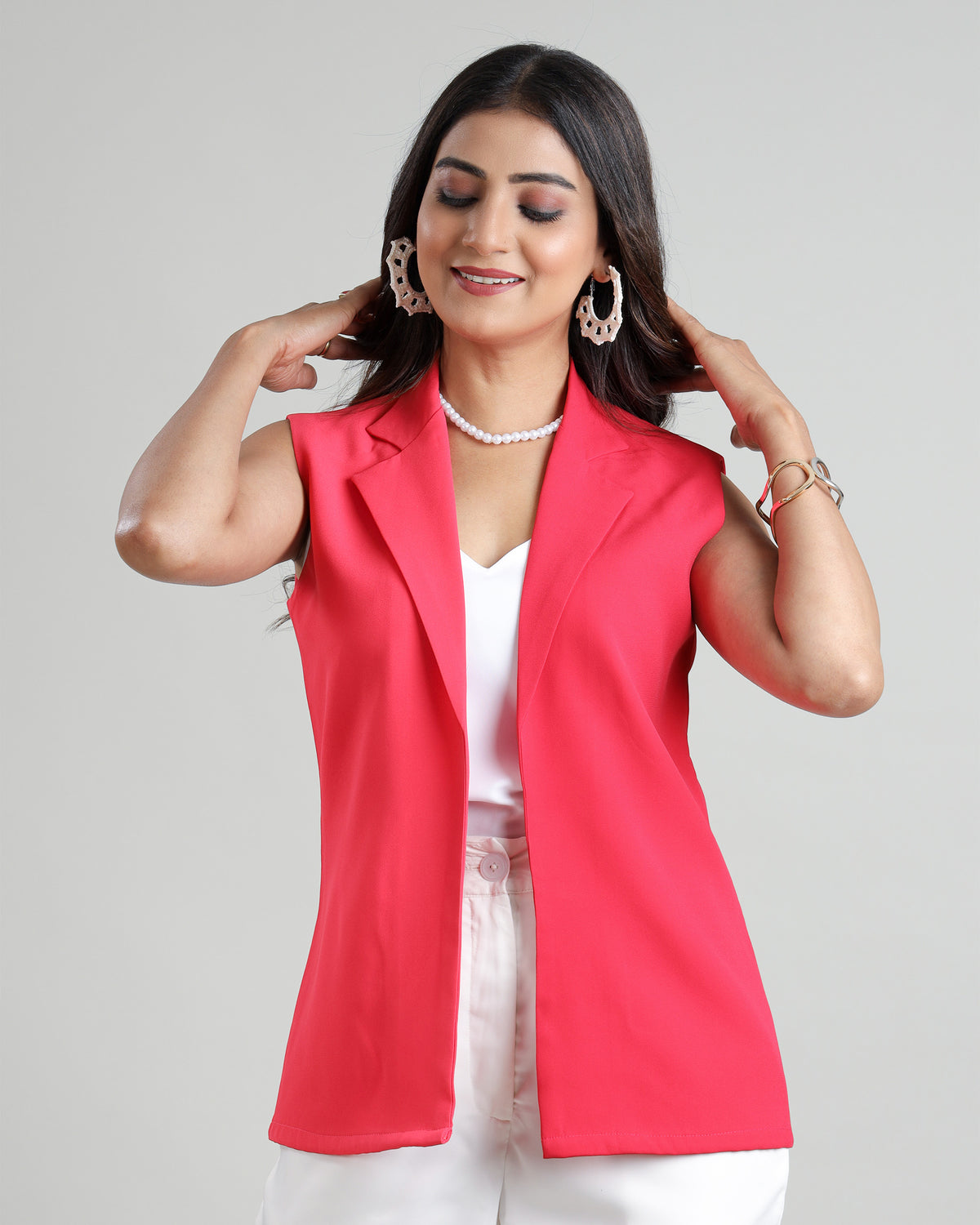 Layer Up in Luxury: Women's Pink Sleeveless Jacket