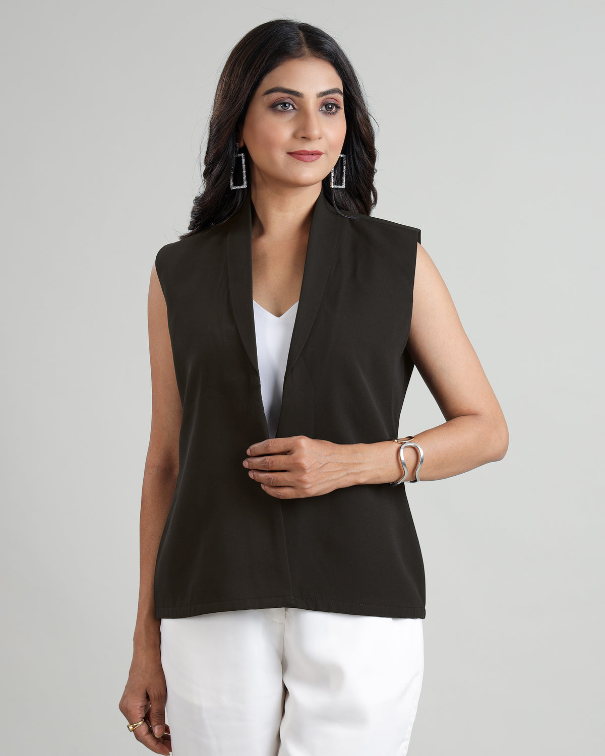 Dress to Empower: The Power Statement Sleeveless Jacket