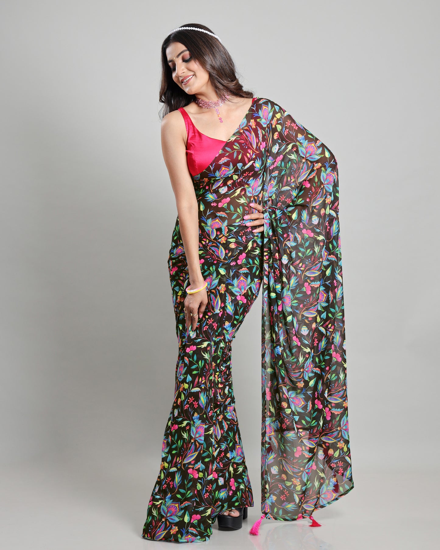 Beyond the Match: A Neon Floral Georgette Saree