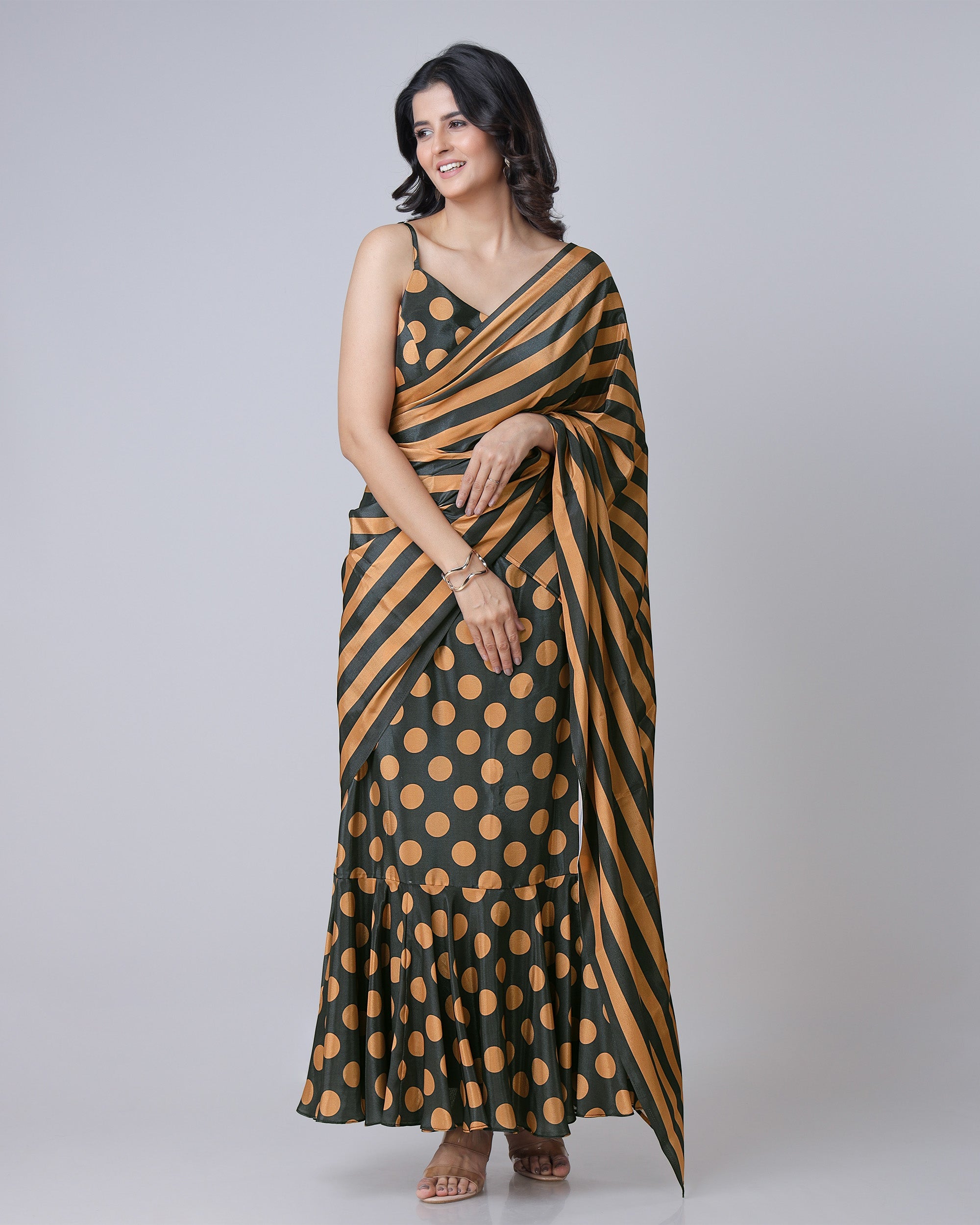 Black And Orange Polkadot Pre Draped Gown Saree With Stripes Pallu Fabcurate