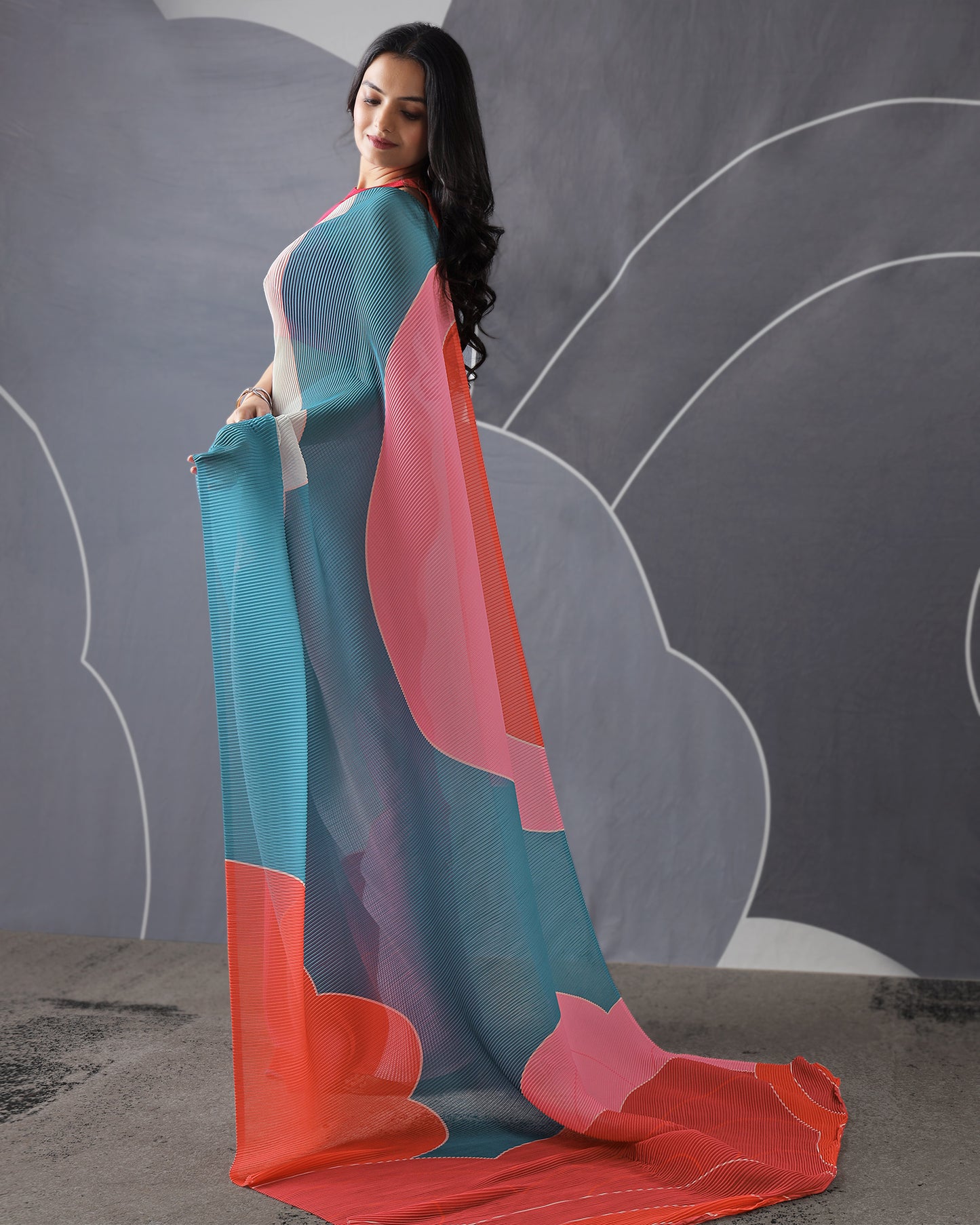 A Masterpiece Of Design: Our Multi-Color Pleated Saree