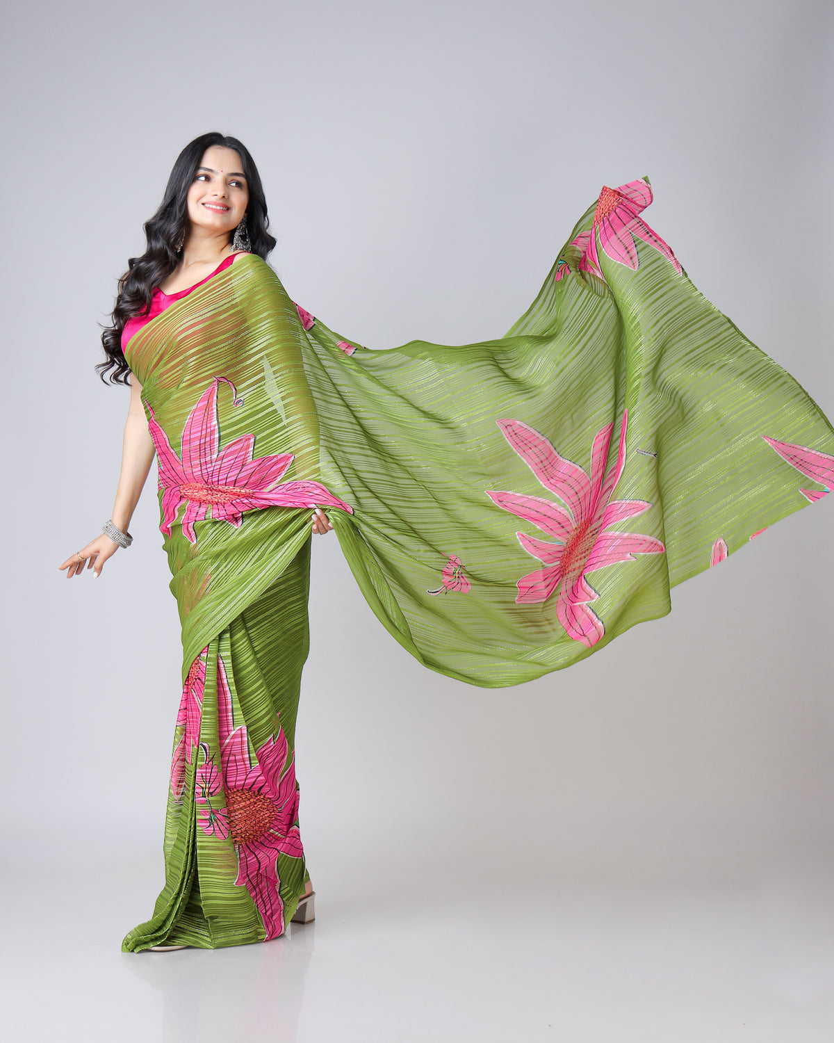 Timeless Elegance: Green Floral Georgette Saree with Embellished Silver Lurex