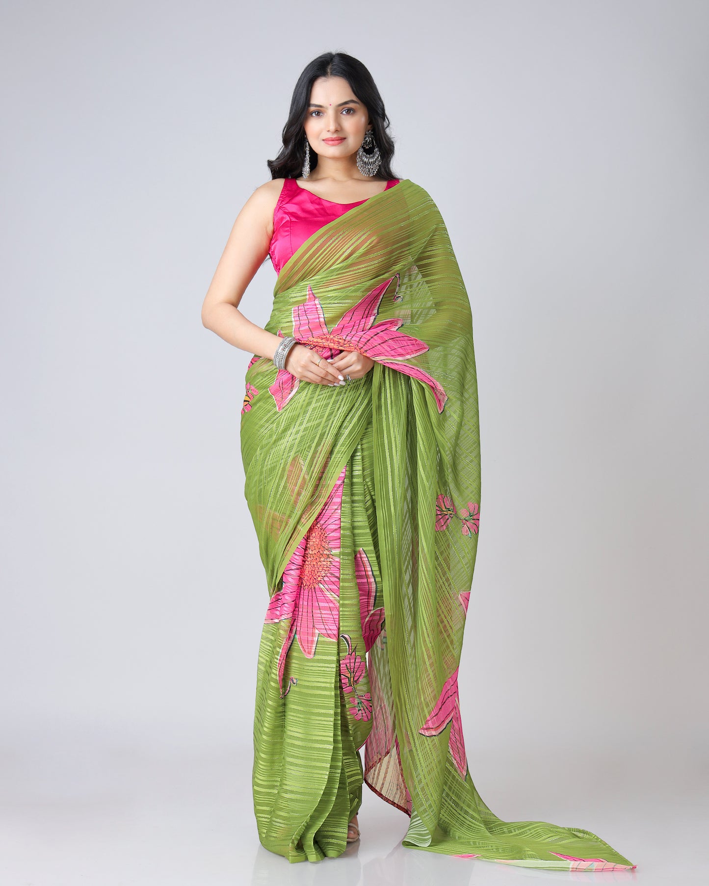 Timeless Elegance: Green Floral Georgette Saree with Embellished Silver Lurex