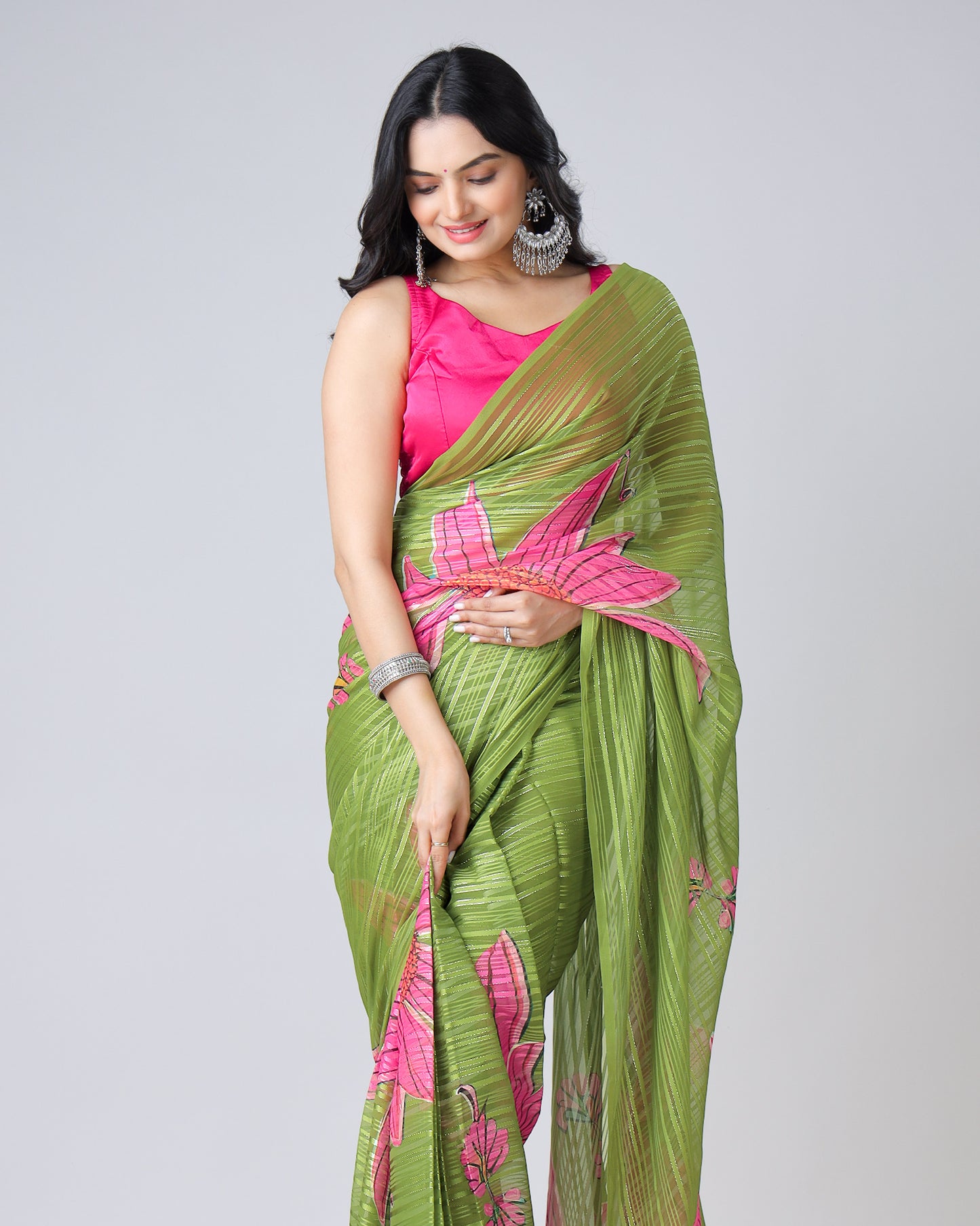 Timeless Elegance: Green Floral Georgette Saree with Embellished Silver Lurex