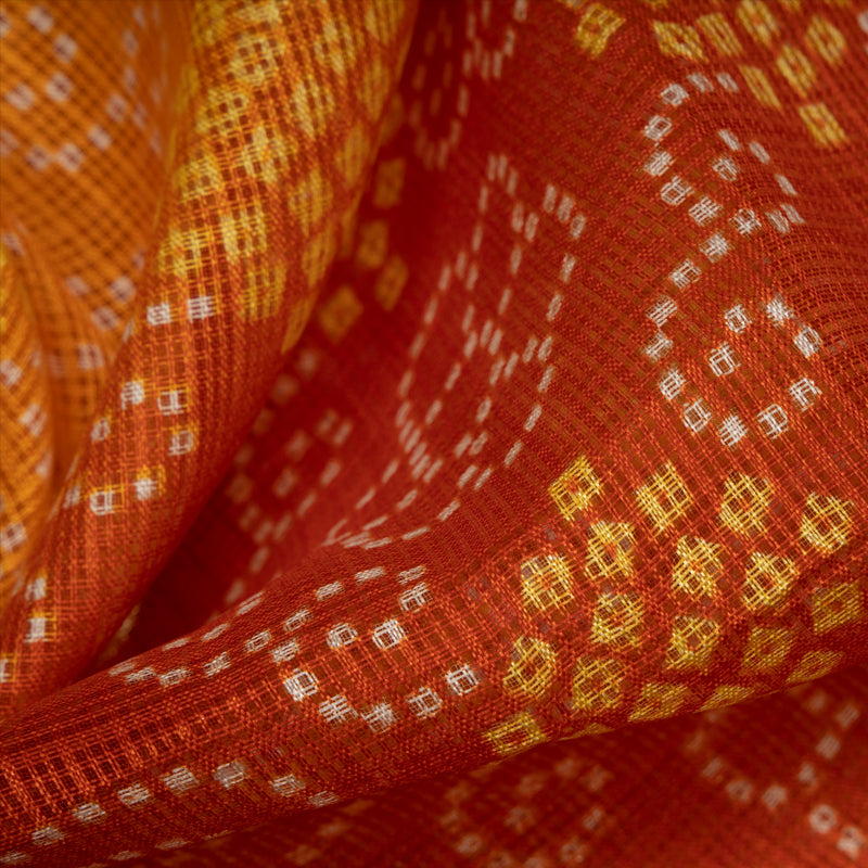 Yellow And Orange Bandhani Pattern Foil Print Kota Doria Fabric - Fabcurate