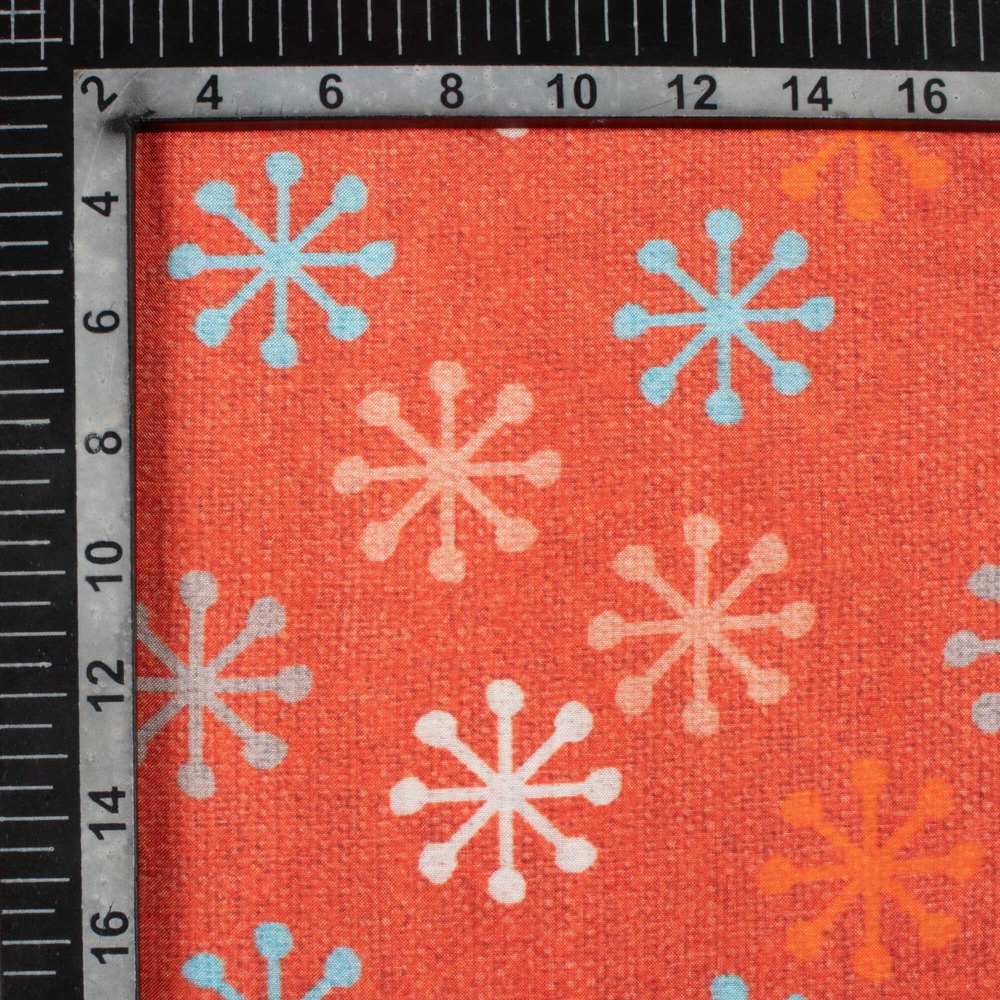 Burnt Orange And Sky Blue Geometric Pattern Digital Print Viscose Muslin Fabric