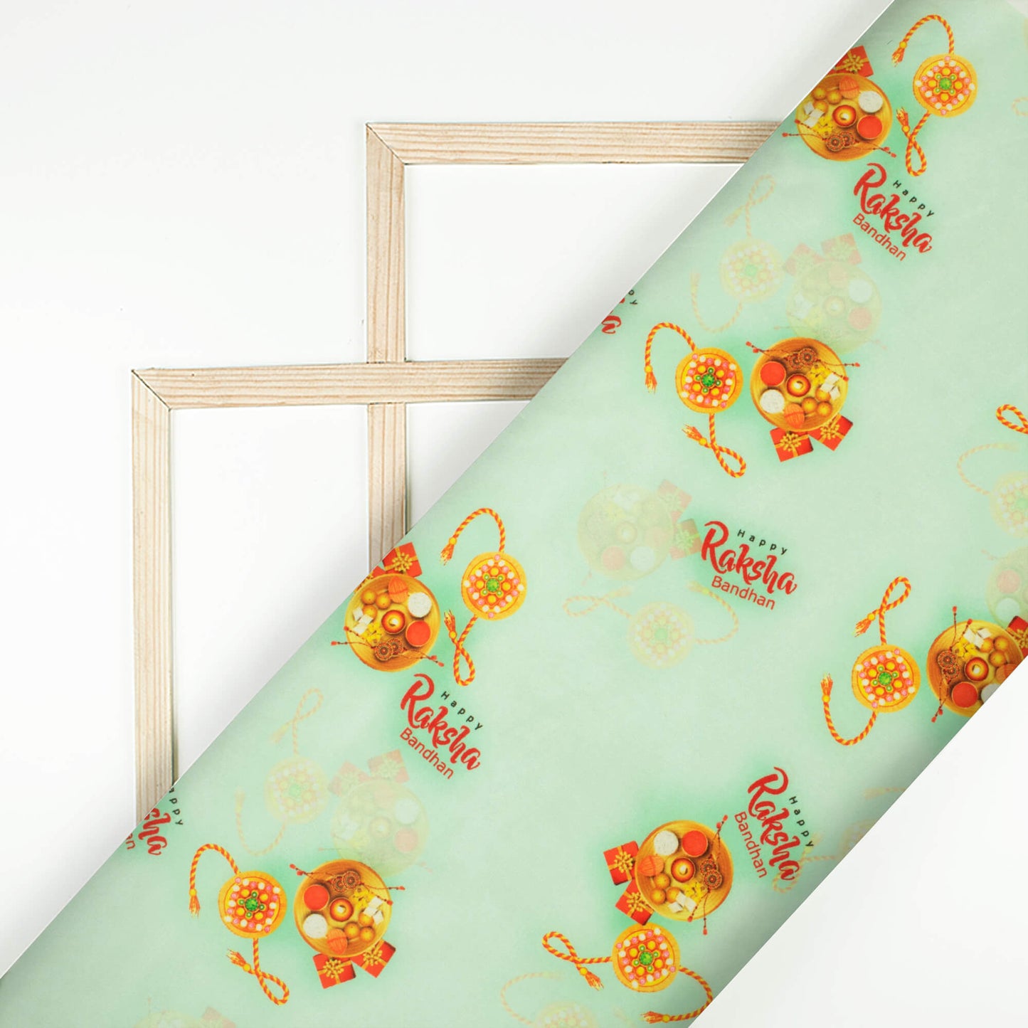 Mint Green And Amber Orange Rakhi Pattern Digital Print Crepe Silk Fabric