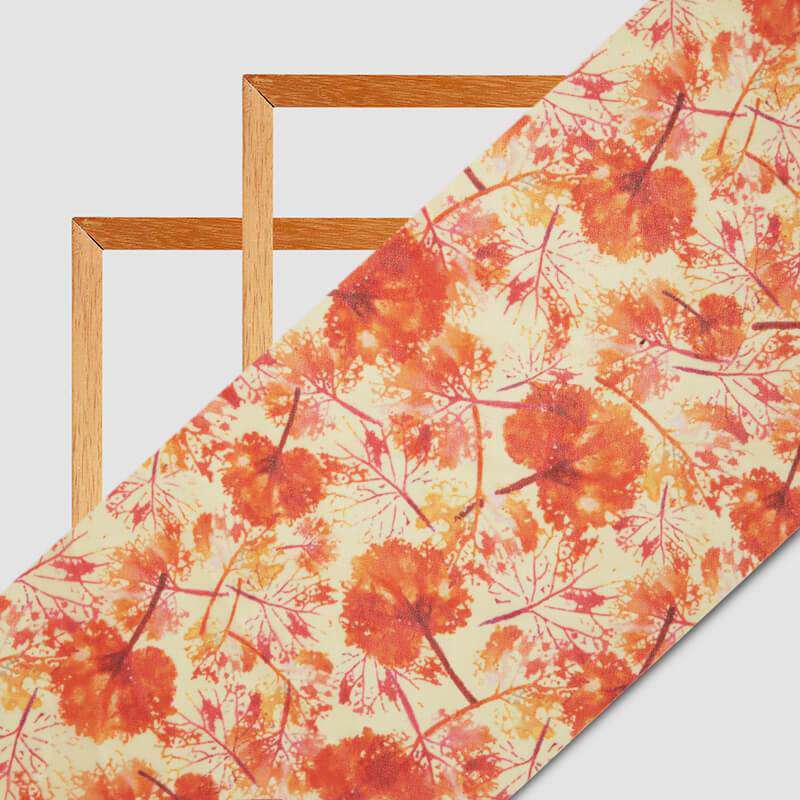Cream And Orange Leaf Pattern Digital Print Muslin Fabric - Fabcurate