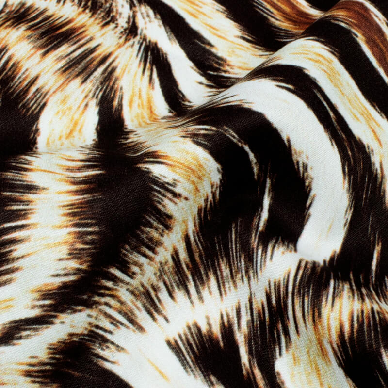 Black And Rust Orange Animal Pattern Digital Print Crepe Fabric - Fabcurate