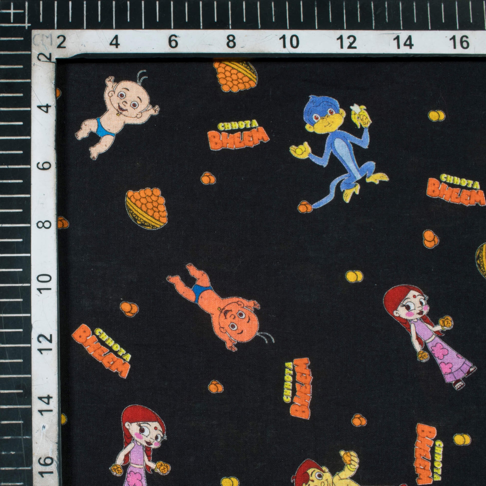 Black And Orange Kids Pattern Digital Print Cotton Cambric Fabric - Fabcurate