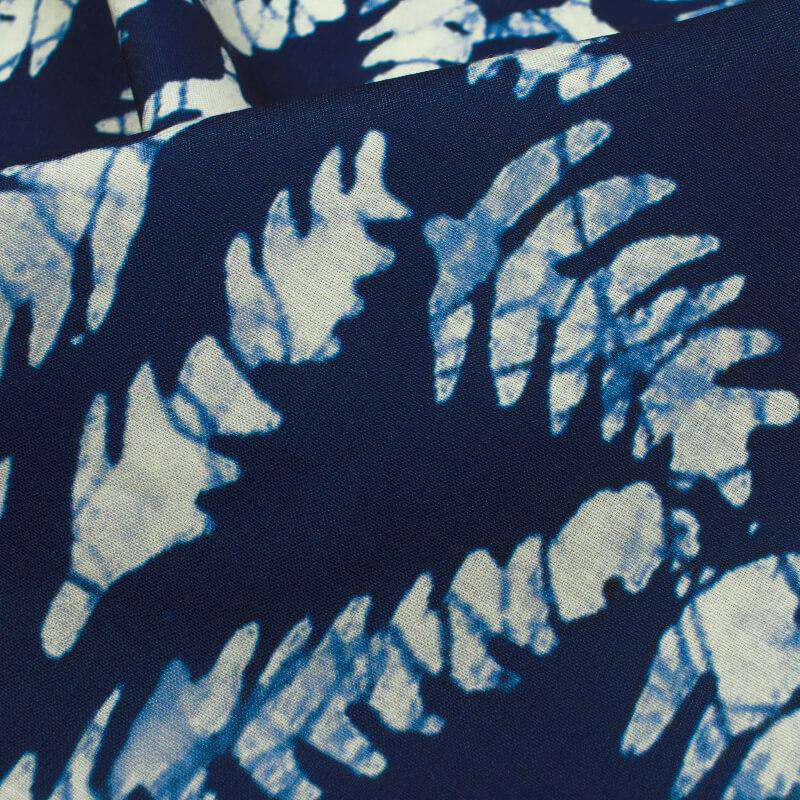 Navy Blue And White Leaf Pattern Digital Printed Muslin Fabric - Fabcurate