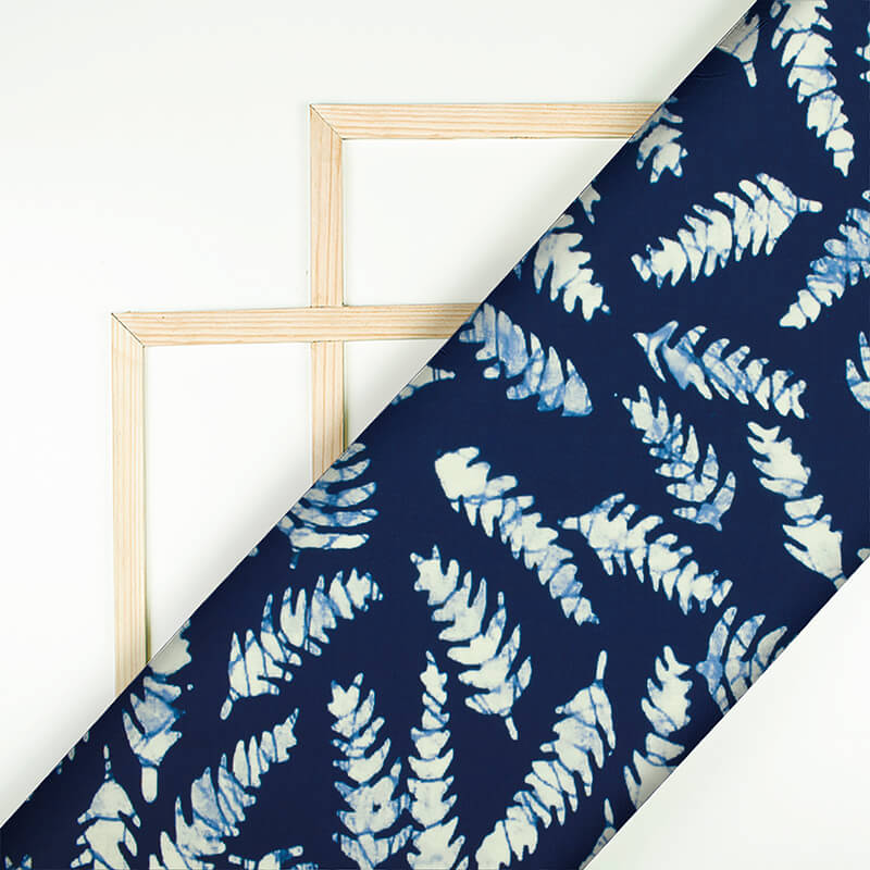 Navy Blue And White Leaf Pattern Digital Printed Muslin Fabric - Fabcurate