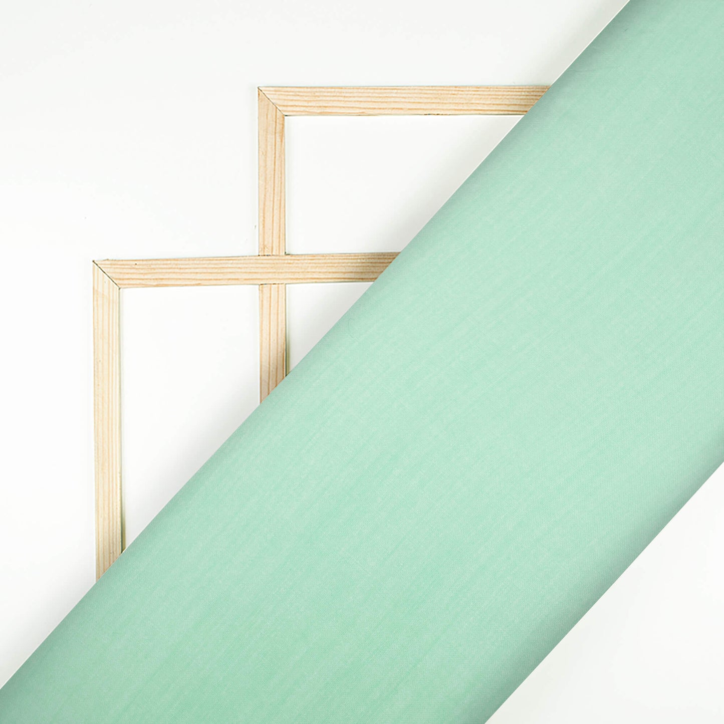 Mint Green Plain Poly Muslin Fabric
