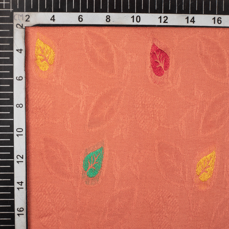 Coral Peach And Yellow Leaf Pattern Rayon Jacquard Fabric - Fabcurate
