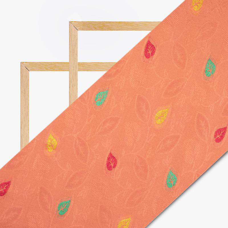 Coral Peach And Yellow Leaf Pattern Rayon Jacquard Fabric - Fabcurate
