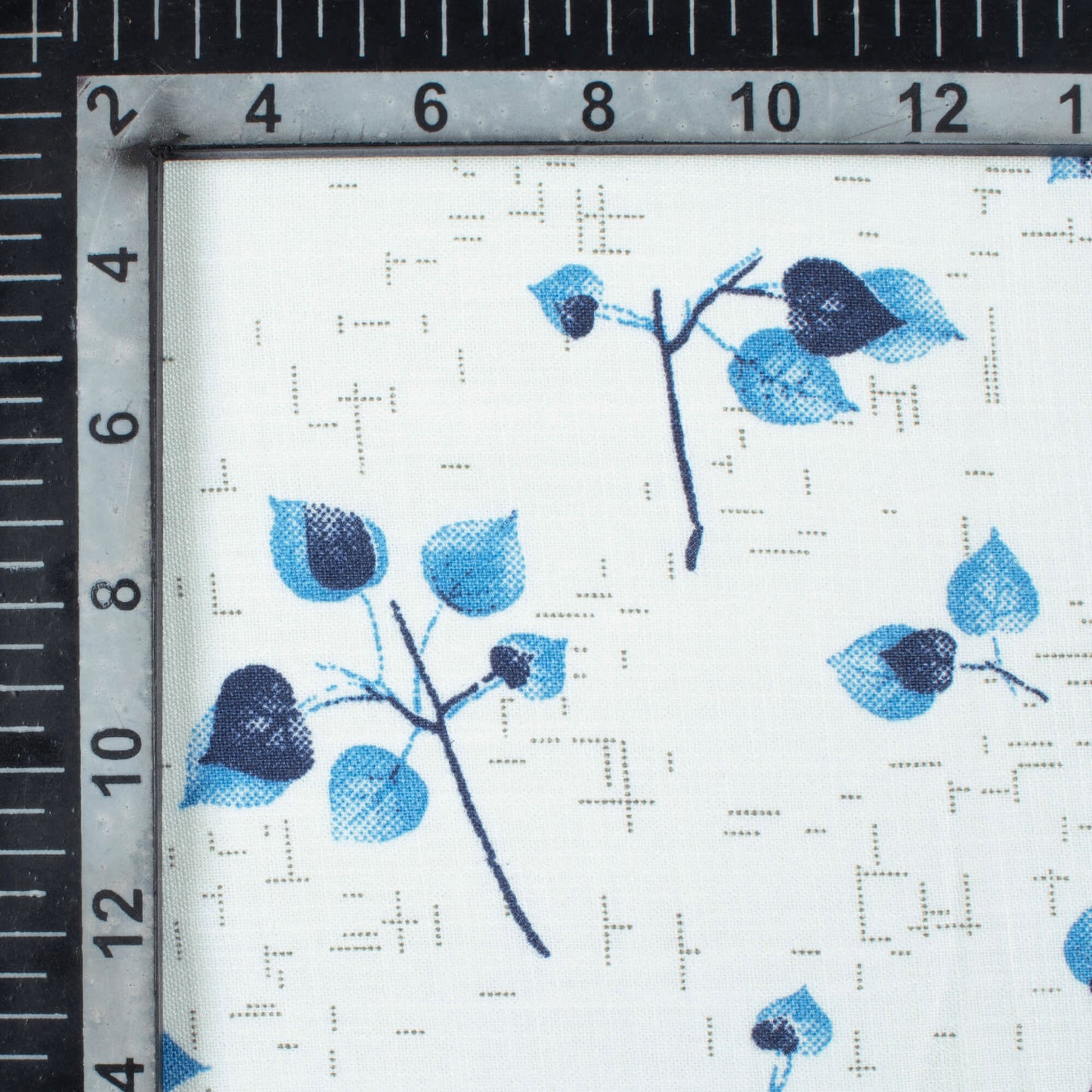 White And Curious Blue Leaf Pattern Printed Poly Spun Exclusive Shirting Fabric (Width 36 Inches)