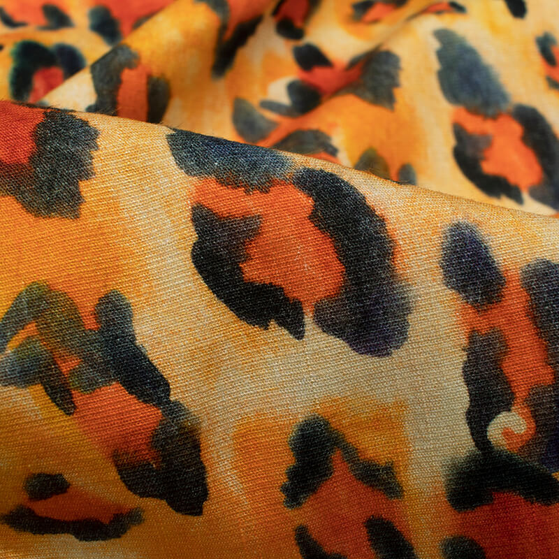 Orange And Black Leapord Animal Pattern Digital Print Rayon Slub Lycra Fabric - Fabcurate
