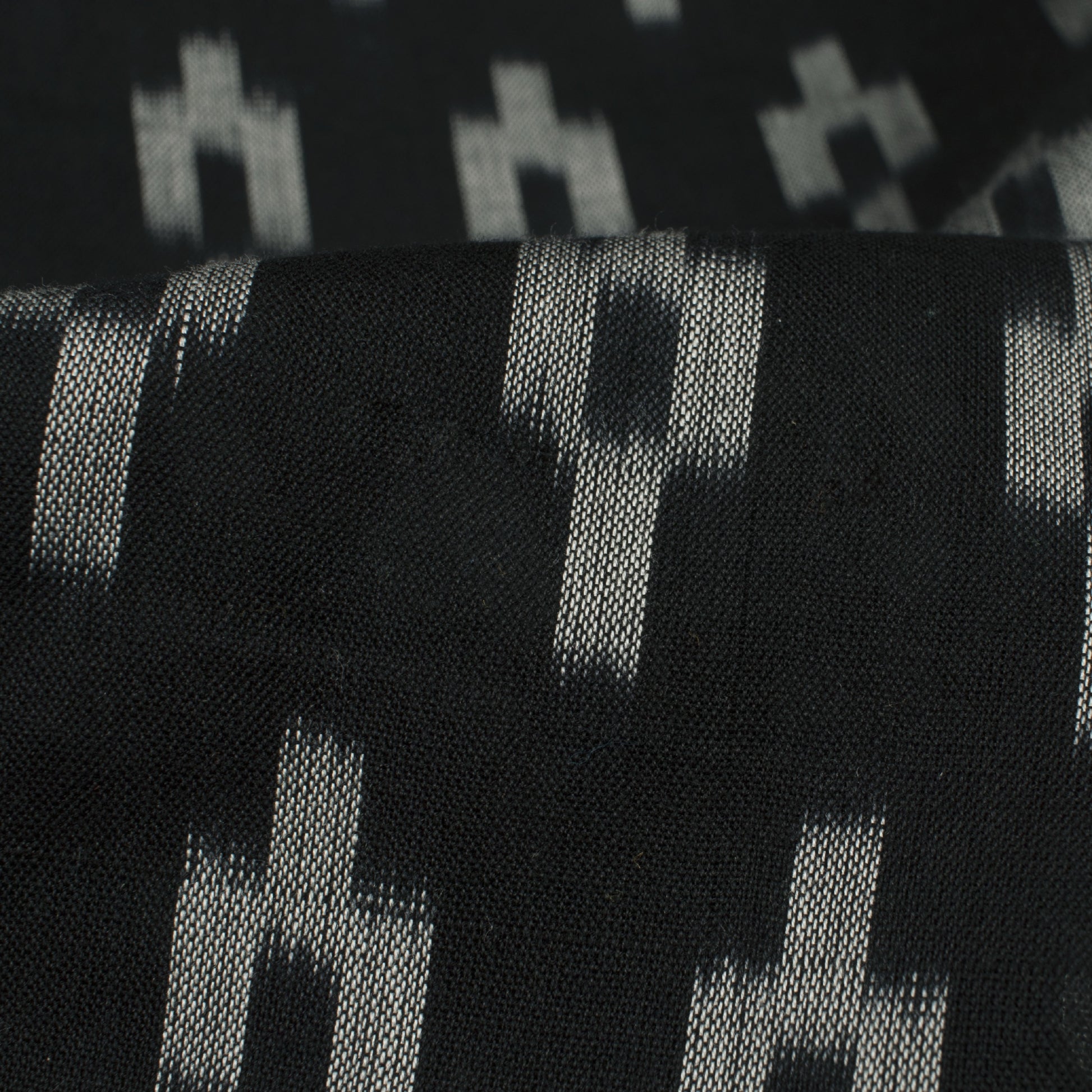 Black And Snow White Geometric Pattern Pre-Washed Mercerised Ikat Cotton Fabric - Fabcurate