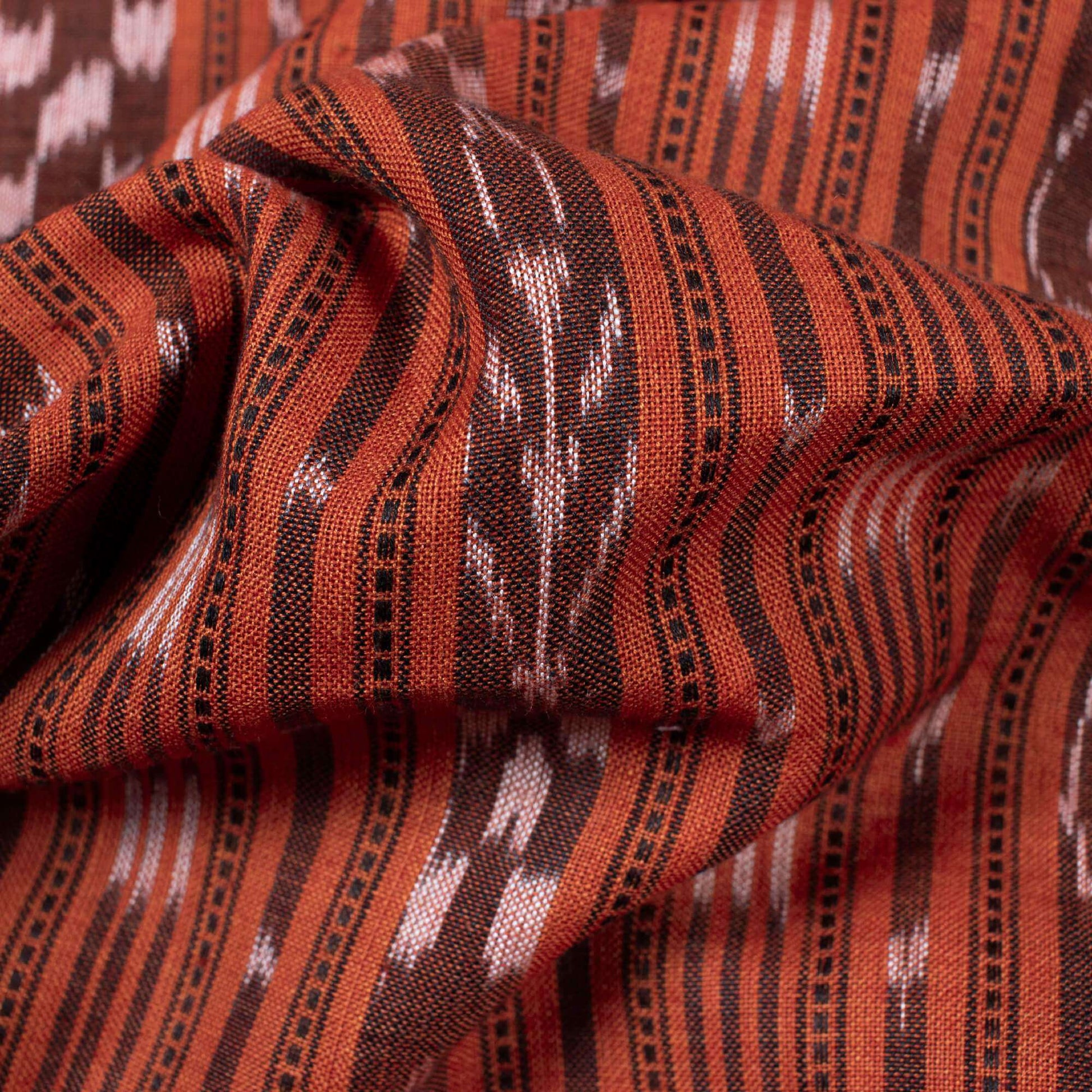 Burnt Orange Stripes Pattern Loom Textured Pre-Washed Mercerised Sambhalpuri Ikat Cotton Fabric - Fabcurate
