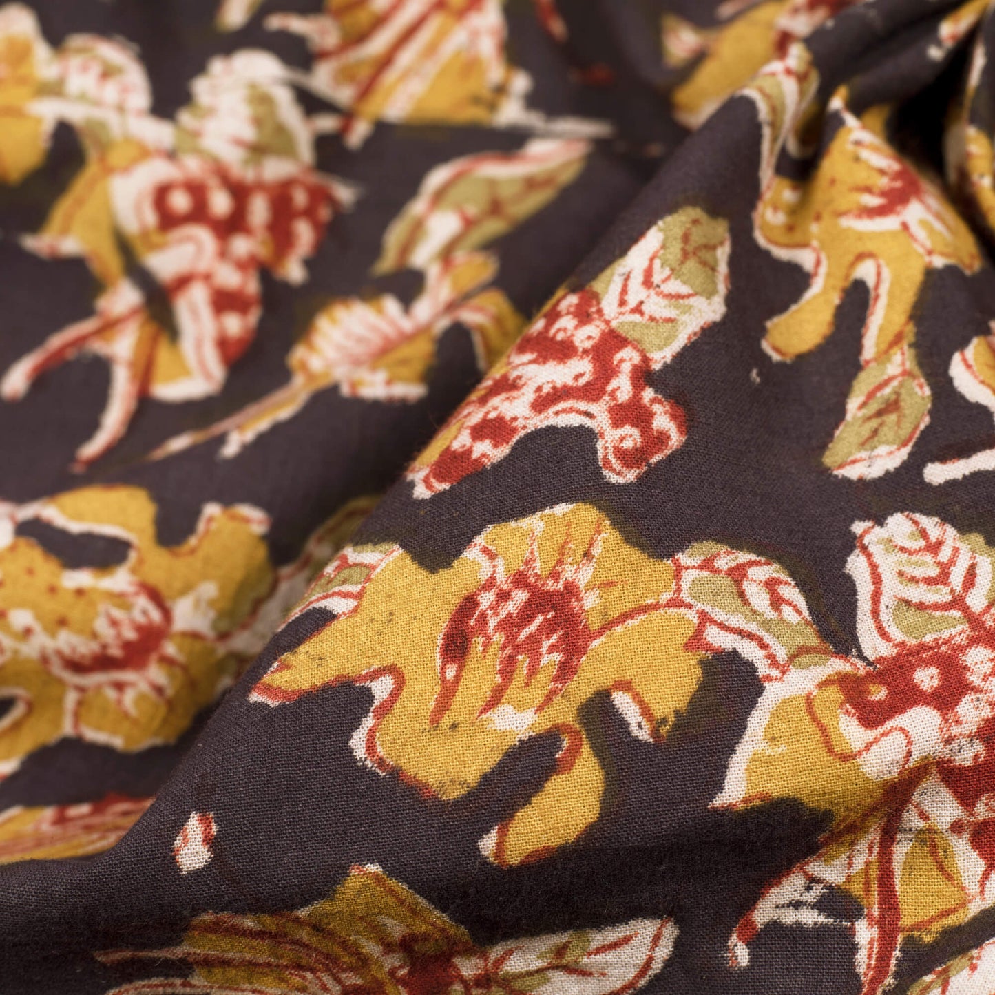 Jade Black And Mustard Yellow Floral Pattern Handblock Kalamkari Cotton Fabric - Fabcurate