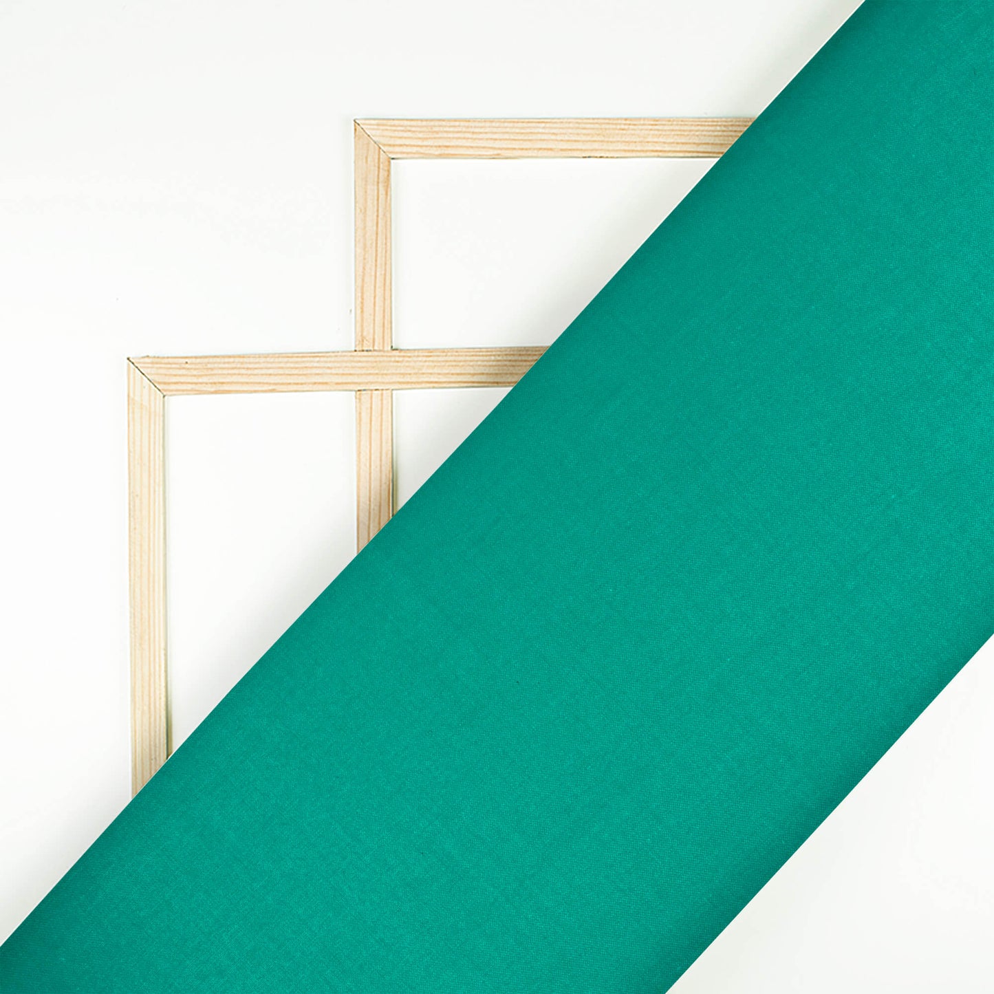 Pine Green Plain Glazed Cotton Fabric - Fabcurate