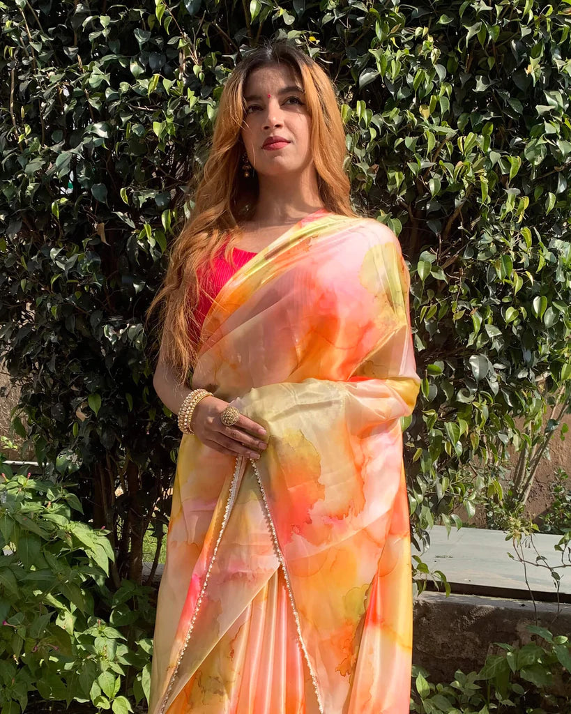 Orange And Moss Green Marble Pattern Liquid Organza Saree With Pearl Work Lace