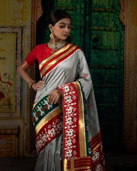 Dolphin Grey And Maroon Patolaa Pattern Zari Jacquard Bordered Premium Banarasi Silk Saree