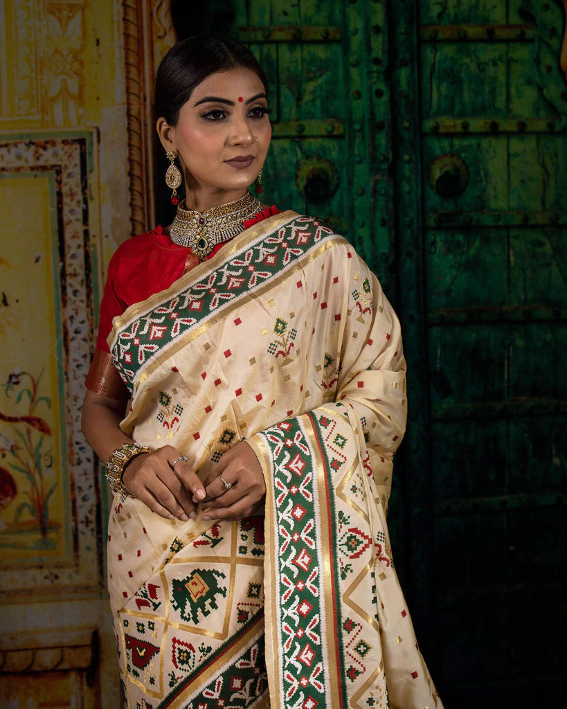 Cream And Green Patola Pattern Zari Jacquard Bordered Premium Banarasi Silk Saree With Blouse