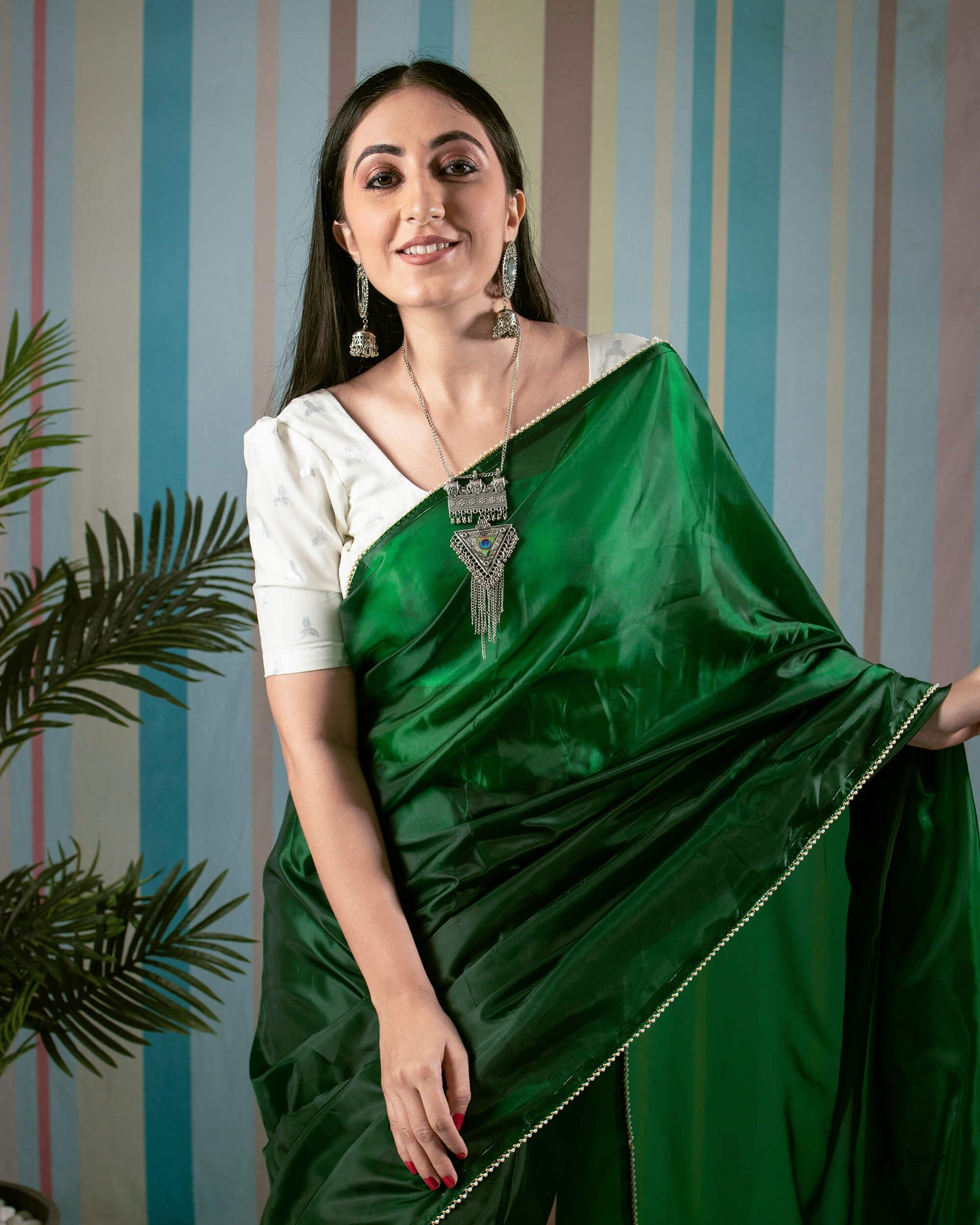 Pine Green Plain Liquid Organza Saree With Pearl Work Lace Border