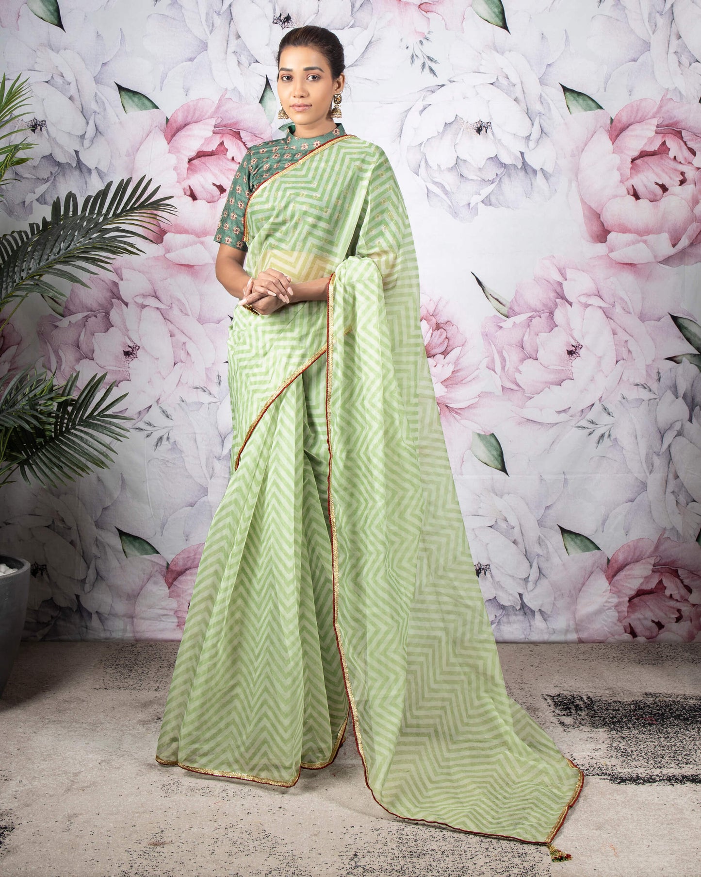Sage Green And White Chevron Pattern Organza Saree With Sequins Lace Border