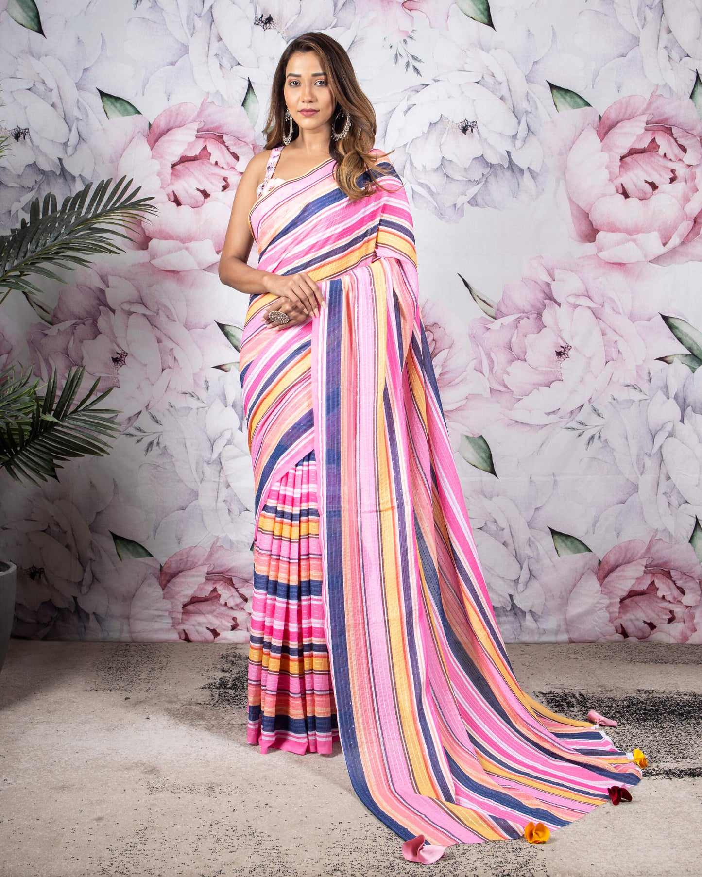 Taffy Pink And Blue Stripes Pattern Sequins Georgette Saree With Tassels
