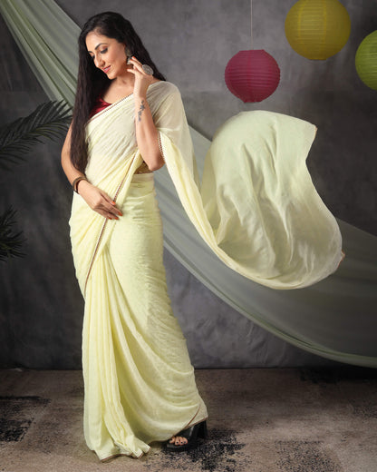 Pastel Yellow Leheriya Golden Dew Drops Georgette Saree With Zari Lace Border