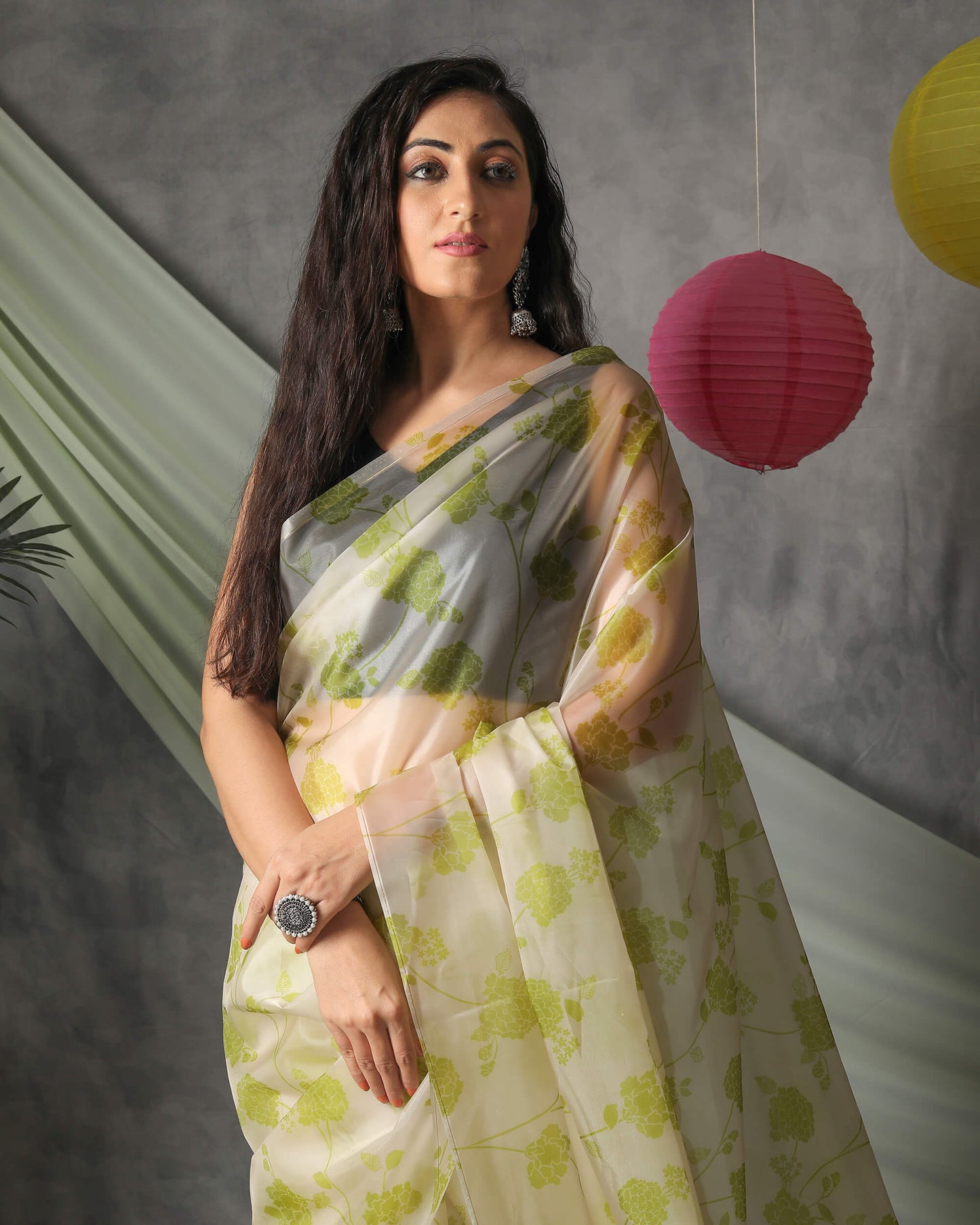 Moss Green And Off White Floral Pattern Organza Saree With Tassels