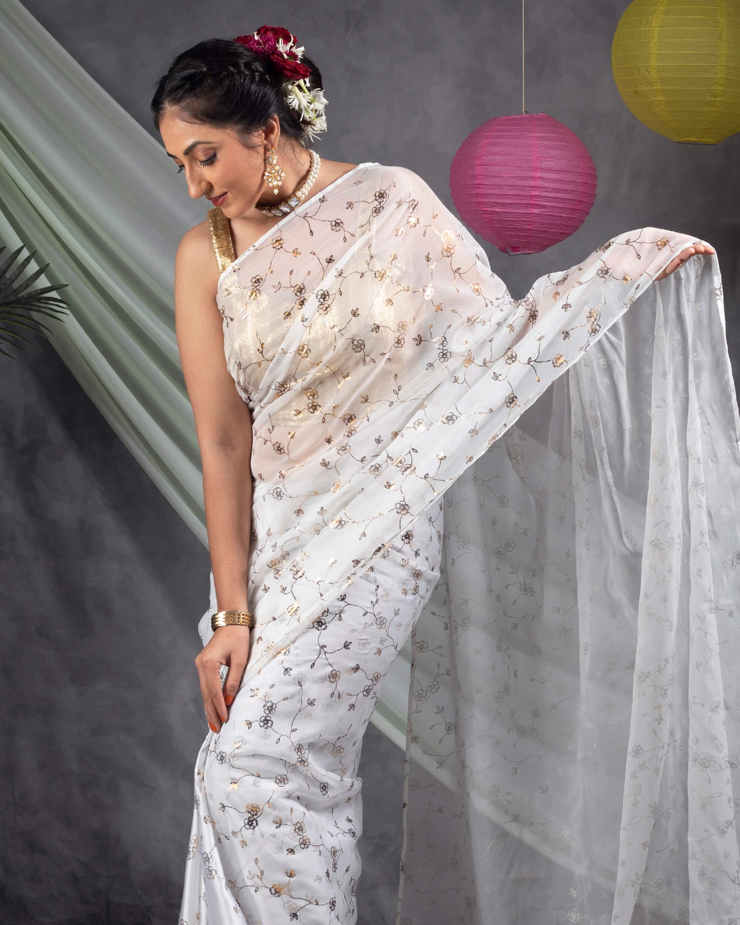 White Floral Pattern Half Golden Foil Print Organza Saree With Tassles