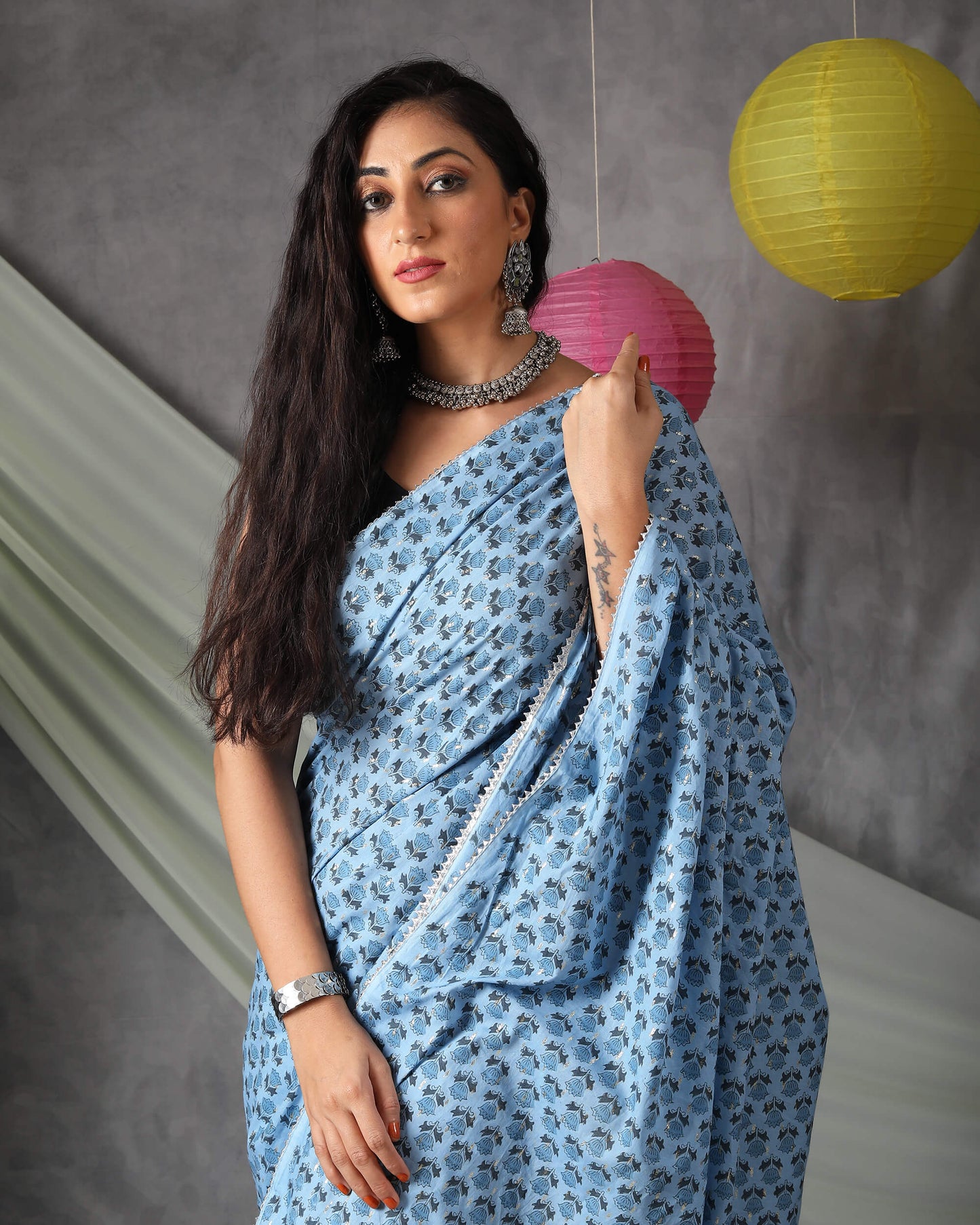 Jordy Blue Half Floral Pattern Handblock Cotton Lurex Saree With Goden Zari Lace Border