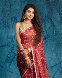 Sangria Red And Yellow Bandhanii Pattern Digital Print Water Lurex Chiffon Saree With Tubular Beads Sequins Lace Border