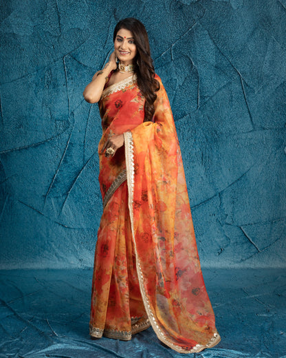 Orange And Red Floral Pattern Shimmer Tisshu Saree With Zari Sequins Lace Border