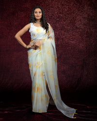 White And Honey Yellow Floral Pattern Digtal Print Shimmer Tisshu Saree With Tassles